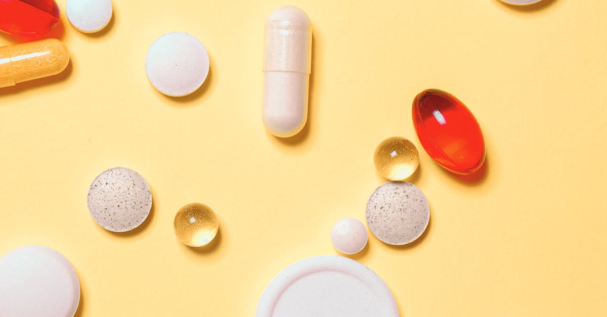 pilules medicamenteuses rouges et blanches