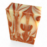 Savon artisanal naturel marbré rouge et ivoire au parfum grenade et beurre de mangue.