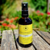 Flacon de parfum d'ambiance "Citrina" avec un mélange d'huiles essentielles de bergamote, pamplemousse, citron vert et lemongrass, inspiré par l'Occitanie.
