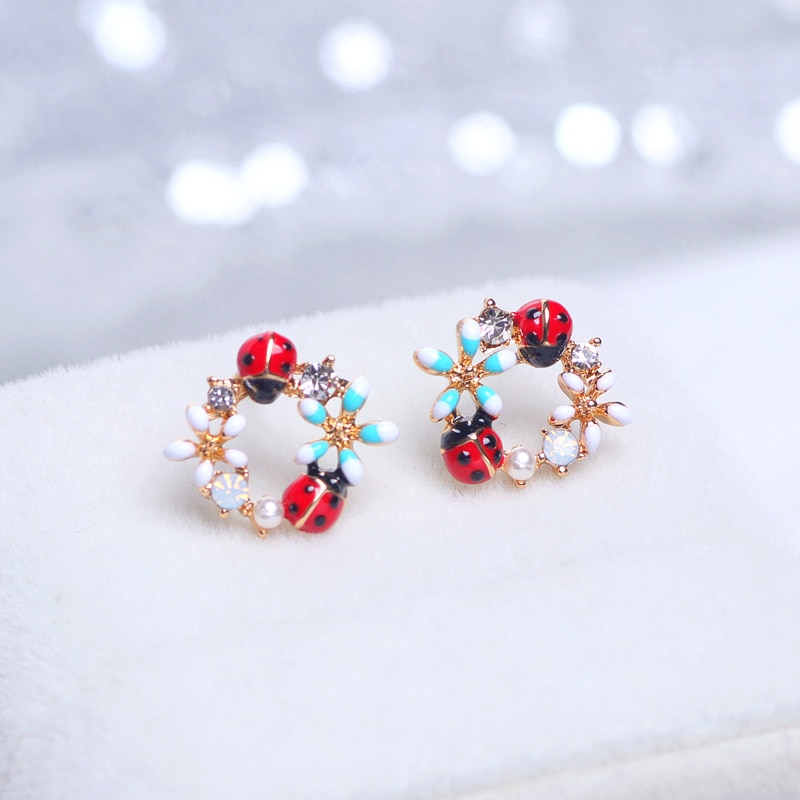 Boucles d oreilles coccinelles fleurs Au Bonheur des Coccinelles