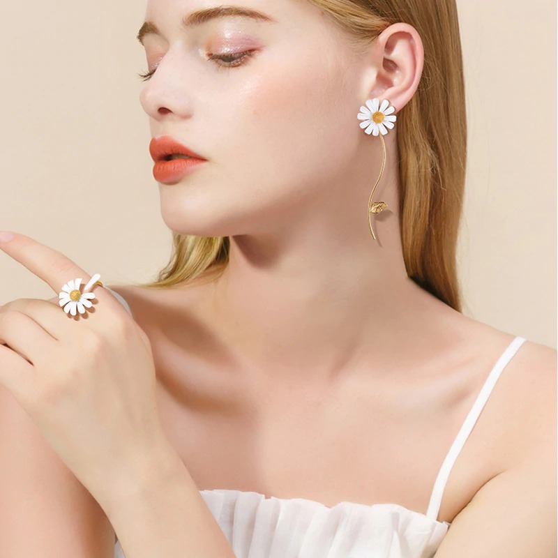 Boucles doreilles asymetriques marguerites