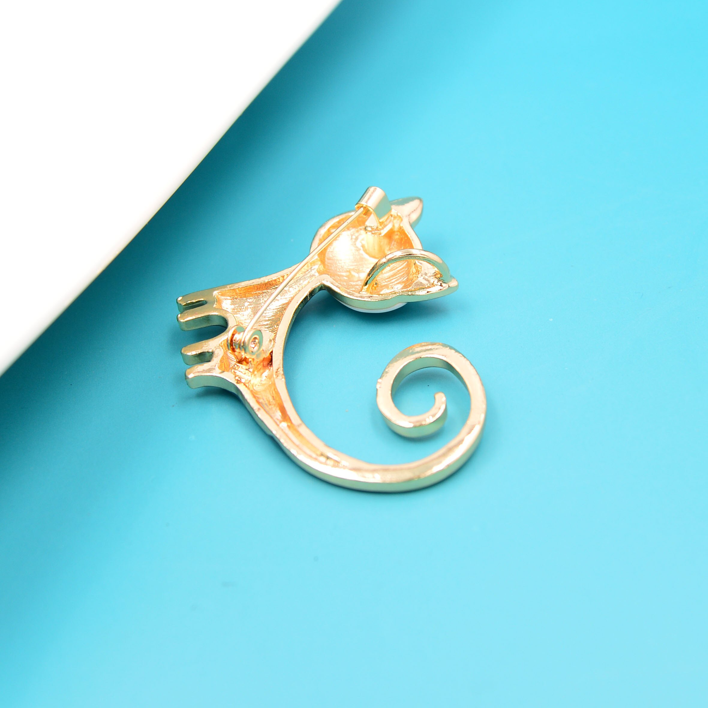 broche chat cuivre