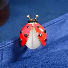 broche coccinelle nacrée
